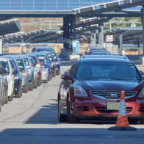 lines of cars waiting for mobile food distribution to open
