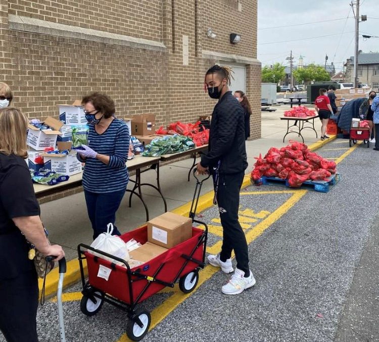 School-Pantry-e1627658951375 People lining up at a food distribution center
