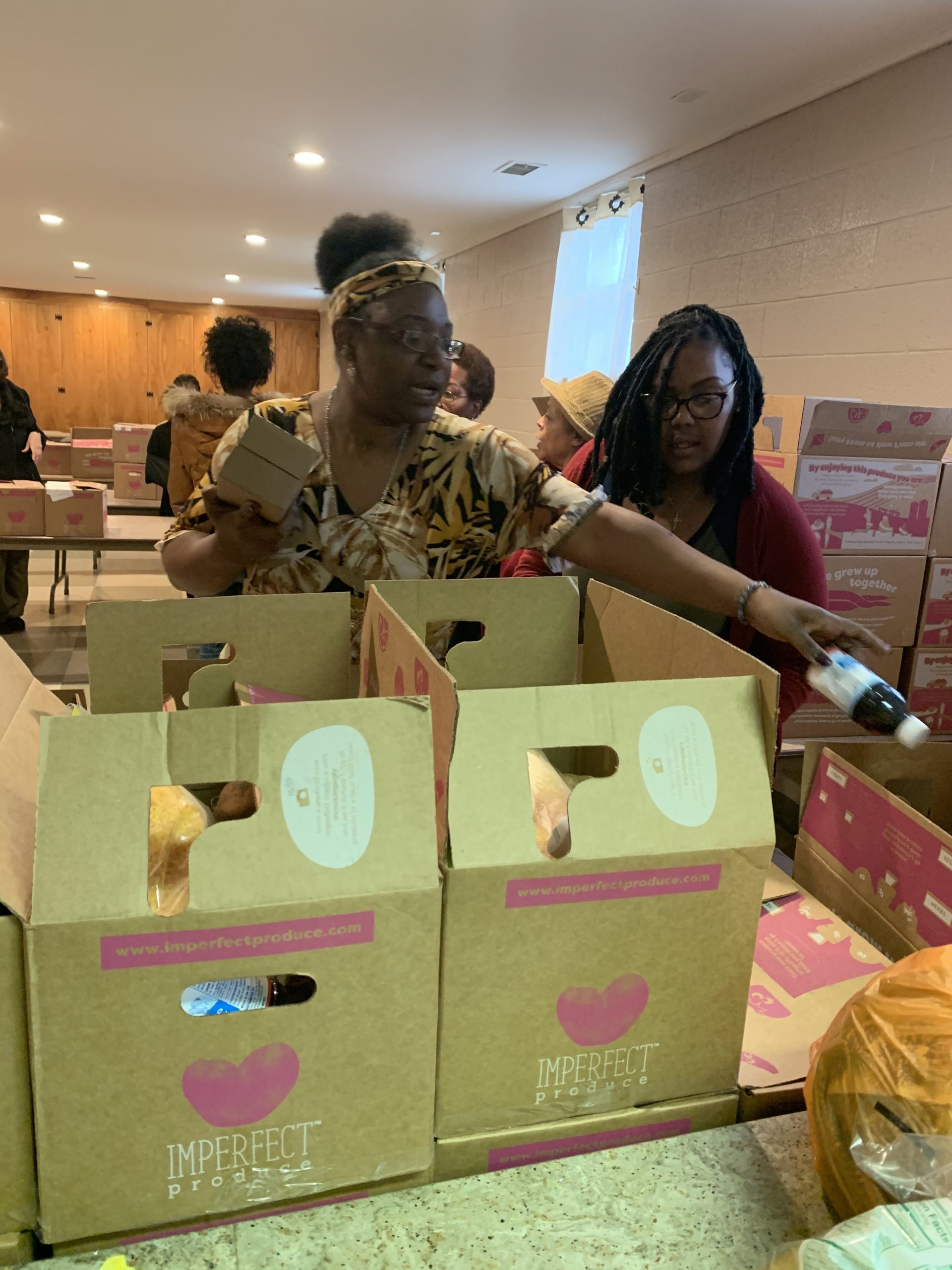 IMG_1958-copy-scaled two women sorting food