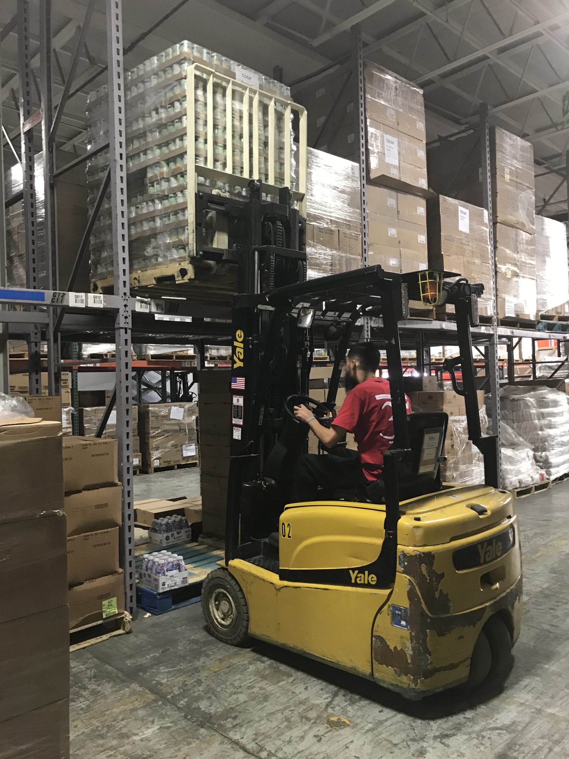 FACILITY_2419-scaled Forklift moving palates of food